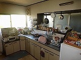 リフォーム前の台所のキッチンセットと換気扇